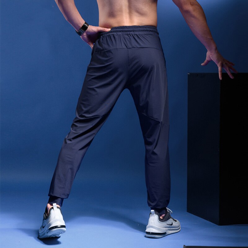 Mens Joggers Casual Pants Fitness Men Sportswear Tracksuit Bottoms Skinny Sweatpants Trousers Gyms Casual Elastic Pants