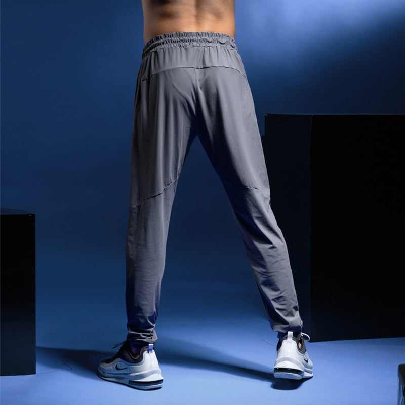 Mens Joggers Casual Pants Fitness Men Sportswear Tracksuit Bottoms Skinny Sweatpants Trousers Gyms Casual Elastic Pants