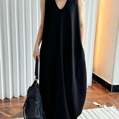 Load image into Gallery viewer, Women Black Brief Irregular Shaped Pocket Long Elegant Dress New V-Neck Sleeveless Fashion Tide Spring Autumn 2025 1DH9419
