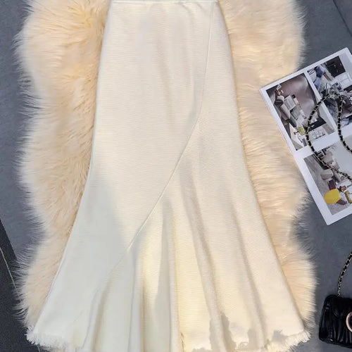 Load image into Gallery viewer, Korean Version Black Beige Tassel Elegant Knit Pleated Long Skirt Women Autumn Winter Pink High Waist Wrap Hip Fishtail Skirts
