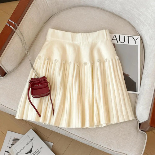Load image into Gallery viewer, Korean Version Women Black Beige Pearl Sexy Club Vacation Short Skirt Autumn Winter Grey Elastic High Waist Party Pleated Skirts
