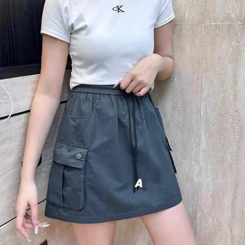 Load image into Gallery viewer, Korean Version Women Solid Drawstring Elastic Waist Lace-up Slim High Waist Work Short Skirt Summer Versatile Pockets Mini Skirt
