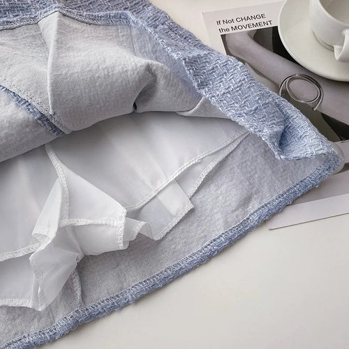 Load image into Gallery viewer, Autumn Winter Retro Plaid Slim Pleated A-line Woolen Half-length Skirt Womens Irregular Pearl Buckle High Waist Mini Tweed Skirt
