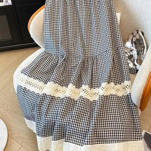 Load image into Gallery viewer, French Sweet Black Plaid Patchwork Lace Hollow Out High Waist Long Skirt 2025 Spring Summer New Women Holiday Pleated Skirt Slim
