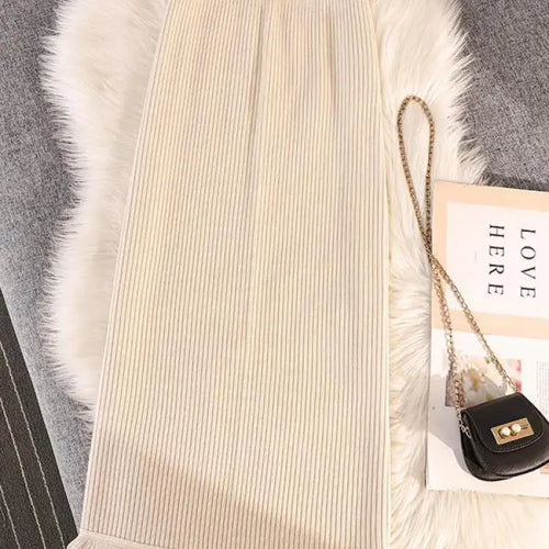 Load image into Gallery viewer, Solid Tassel Split Long Skirts Women Warm Cozy Elegant Casual All-match Korean Elastic Waist A-line Knitted Wrap Hip Skirt Trend
