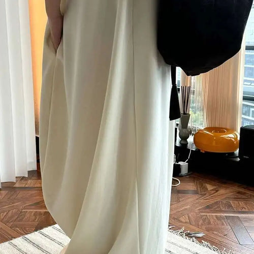 Load image into Gallery viewer, Women Black Brief Irregular Shaped Pocket Long Elegant Dress New V-Neck Sleeveless Fashion Tide Spring Autumn 2025 1DH9419
