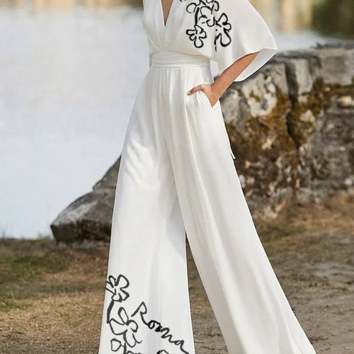 Load image into Gallery viewer, Summer White Pant Jumpsuits for Women Flower Print Pleated Pockets Half Sleeves Deep V-Neck Jumpsuits for Ladies
