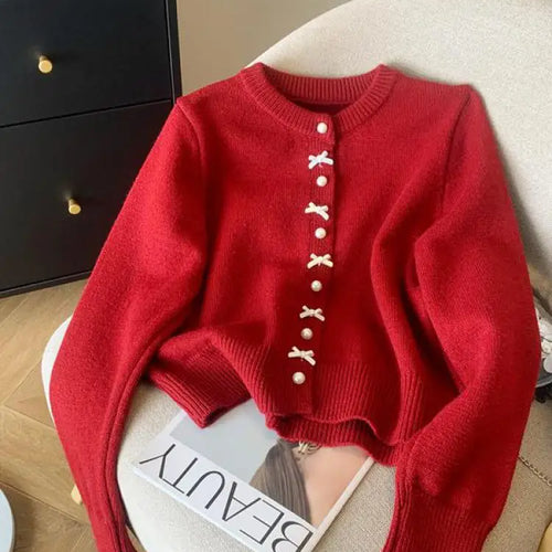 Load image into Gallery viewer, Autumn Winter Sweet Retro Red Bow Pearl Button Knit Cardigan Tops French Fashion Women White Single Breasted Long Sleeve Sweater
