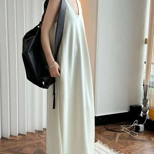 Load image into Gallery viewer, Women Black Brief Irregular Shaped Pocket Long Elegant Dress New V-Neck Sleeveless Fashion Tide Spring Autumn 2025 1DH9419

