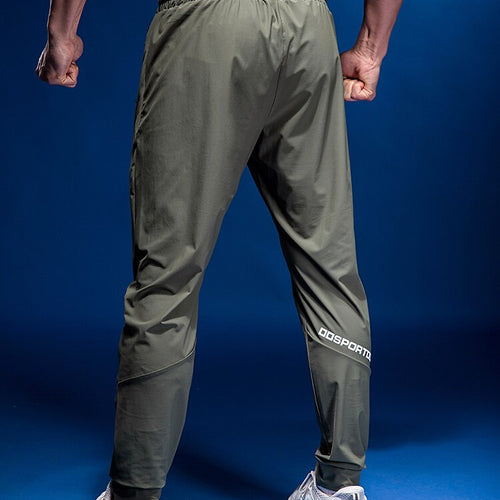 Load image into Gallery viewer, Men Sport Pant Training Bodybuilding Trousers Youngster Fitness Running Sweatpant Thin Elastic Dry Fit Zipper Pockets Long Pants
