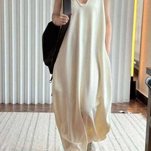 Load image into Gallery viewer, Women Black Brief Irregular Shaped Pocket Long Elegant Dress New V-Neck Sleeveless Fashion Tide Spring Autumn 2025 1DH9419
