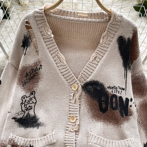 Load image into Gallery viewer, Autumn Winter Women Beige Graffiti Print Loose Long Sleeve Fashion Cardigan Knitted Sweaters Korean Casual Button Hole Tops Chic
