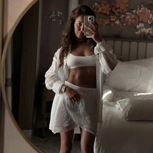 Load image into Gallery viewer, Summer Beach Two Piece Sets Women Long Sleeve Shirt And Mini Skirt Female See Through Loose 2 Piece Set Beachwear
