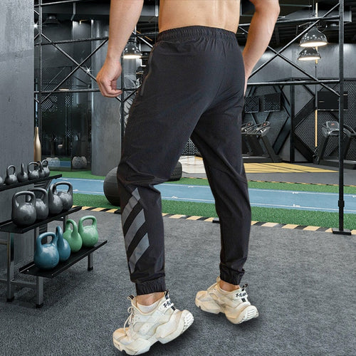 Load image into Gallery viewer, Men Gym Fitness Sports Running Trousers Outdoor Workout Jogging Sweatpants Dry Fit Leggings Zipper Pockets Long Pants
