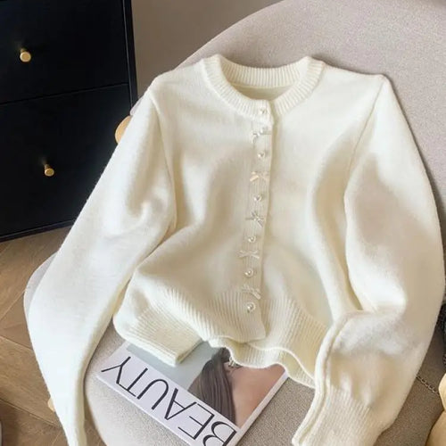 Load image into Gallery viewer, Autumn Winter Sweet Retro Red Bow Pearl Button Knit Cardigan Tops French Fashion Women White Single Breasted Long Sleeve Sweater
