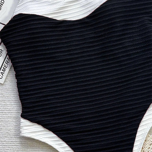 Load image into Gallery viewer, Sexy Black White Patchwork Women One Piece Swimwear 2025 High Waist Backless Monokini Hollow Out Bathing Suit
