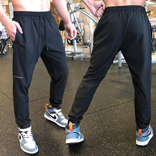 Load image into Gallery viewer, Men Sport Pant Training Bodybuilding Trousers Youngster Fitness Running Sweatpant Thin Elastic Dry Fit Zipper Pockets Long Pants
