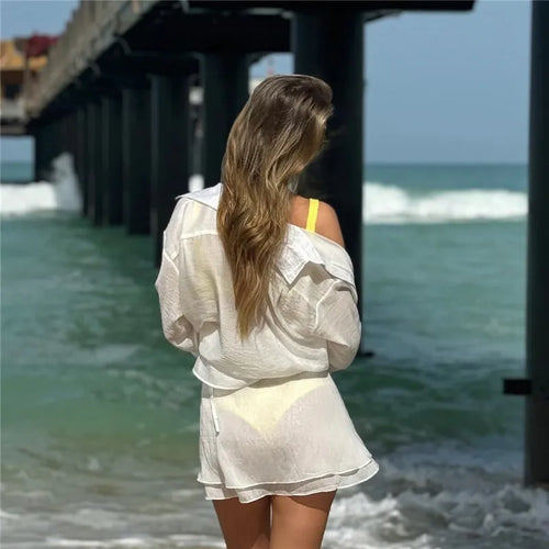 Load image into Gallery viewer, Summer Beach Two Piece Sets Women Long Sleeve Shirt And Mini Skirt Female See Through Loose 2 Piece Set Beachwear
