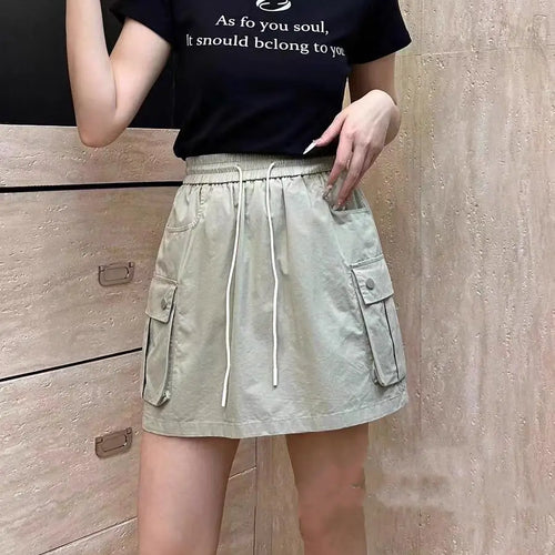 Load image into Gallery viewer, Korean Version Women Solid Drawstring Elastic Waist Lace-up Slim High Waist Work Short Skirt Summer Versatile Pockets Mini Skirt
