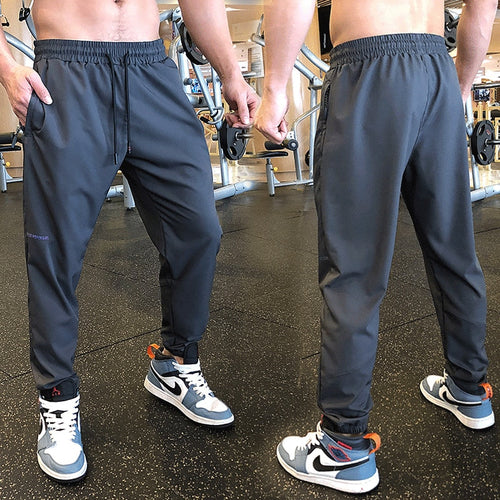 Load image into Gallery viewer, Men Sport Pant Training Bodybuilding Trousers Youngster Fitness Running Sweatpant Thin Elastic Dry Fit Zipper Pockets Long Pants
