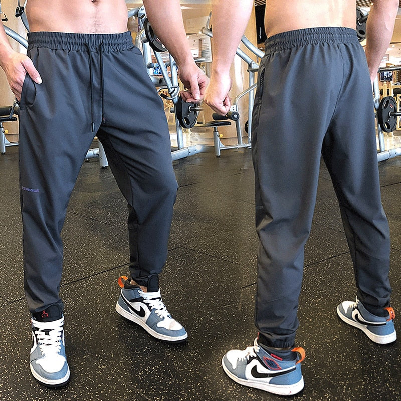 Men Sport Pant Training Bodybuilding Trousers Youngster Fitness Running Sweatpant Thin Elastic Dry Fit Zipper Pockets Long Pants