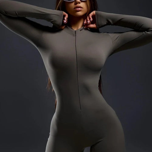 Load image into Gallery viewer, Autumn/Winter Long Sleeve Zipper Skinny Jumpsuit Women Elastic Tight Flare Playsuit Female Fashion Casual Sports Rompers
