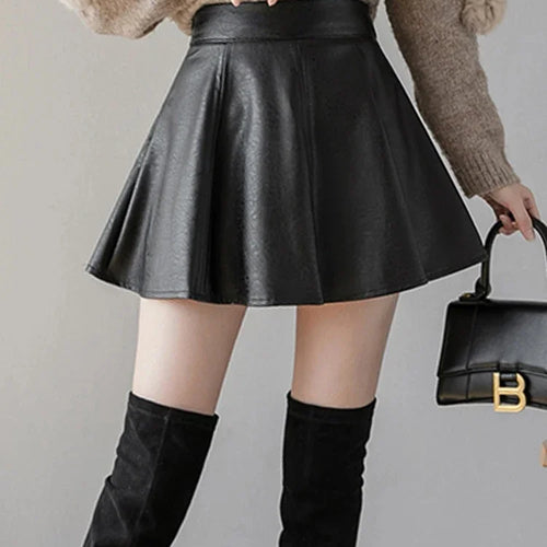 Load image into Gallery viewer, Autumn Korean Fashion Women&#39;s Solid Color PU Pleated Skirts Slim Fit High Waisted Unique Zippered Mini Leather Skirt
