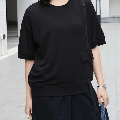 Load image into Gallery viewer, Women Black Irregular Button Pocket Big Size Casual T-shirt New Round Neck Short Sleeve Fashion Spring Summer 2025 1DJ0223
