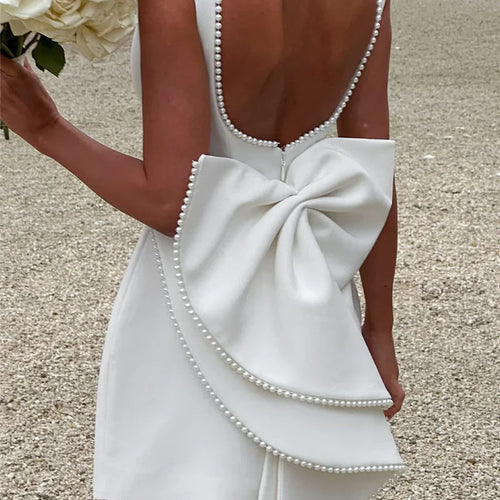 Load image into Gallery viewer, Pearl Bow Backless Sexy Mini Dress For Women Robe Fashion Zipper Sleeveless High Waist A-line Club Party Dress Elegant
