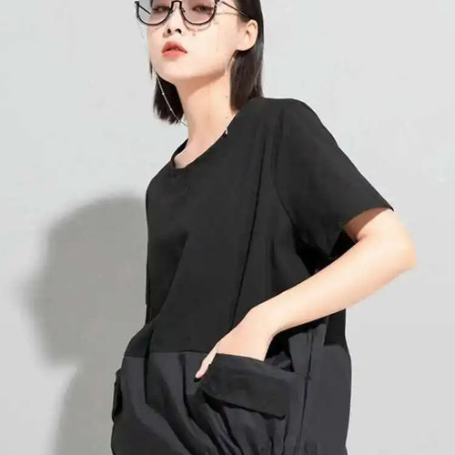 Load image into Gallery viewer, Women Black Big Size Irregular Spliced Pockets T-shirt New Round Neck Short Sleeve Fashion Tide Spring Summer 2025 1DD8085

