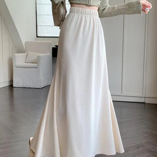 Load image into Gallery viewer, Autumn Winter Women's Black Elastic High Waist Fishtail Skirt Korean Version Beige Elegant Vacation Pleated A-line Long Skirts
