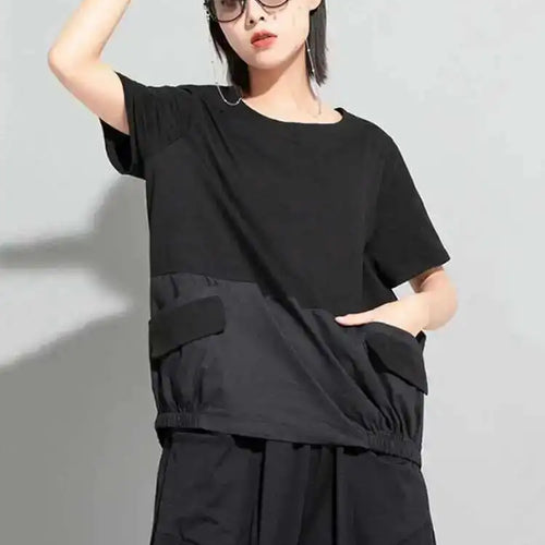 Load image into Gallery viewer, Women Black Big Size Irregular Spliced Pockets T-shirt New Round Neck Short Sleeve Fashion Tide Spring Summer 2025 1DD8085
