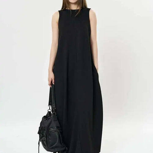 Load image into Gallery viewer, Women Black Brief Irregular Shaped Pocket Long Elegant Dress New V-Neck Sleeveless Fashion Tide Spring Autumn 2025 1DH9419
