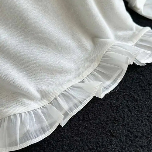 Load image into Gallery viewer, Women Black White Plain Color Ruffles Hem Thin T-shirt New Round Neck Long Sleeve Fashion Tide Spring Autumn 2025 1DJ0815
