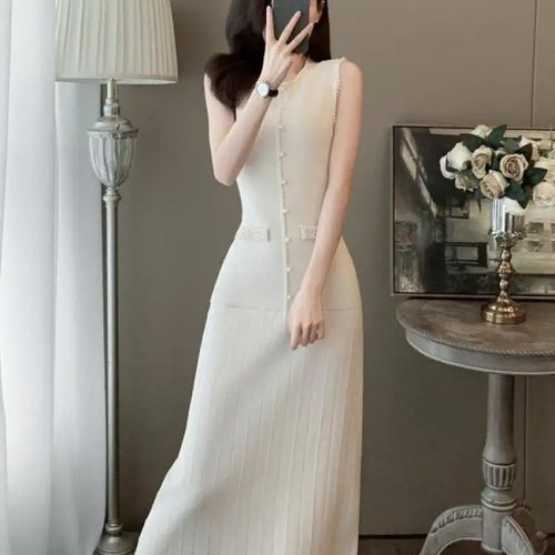 Load image into Gallery viewer, Korean Women's Black Knit Round Neck Sleeveless Office Lady Dress Summer Retro Fashion Beige Pearl Temperament Long Dress Trendy
