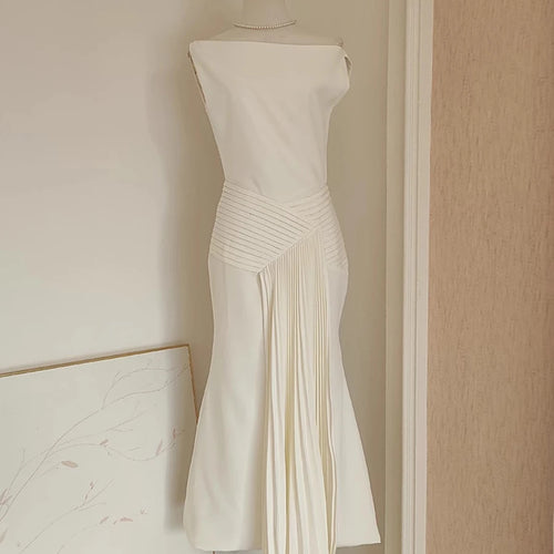 Load image into Gallery viewer, Solid Spliced Folds Slimming Dresses For Women Slash Neck Sleeveless High Waist Temperament Dress Female Fashion
