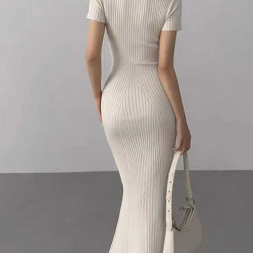 Load image into Gallery viewer, Korean Version Summer Solid Elegant Office Lady Button Knitted Long Dress Women's Slim Short Sleeve Wrapped Hip Fishtail Dresses
