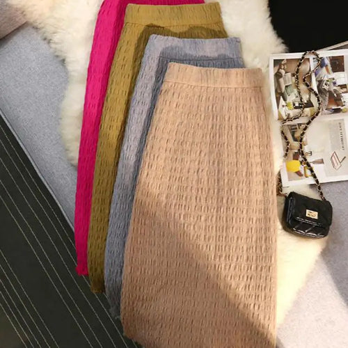 Load image into Gallery viewer, Women Solid Straight Slim Knitted Midi Skirt 2023 Autumn Winter Vintage Elegant Elastic High Waist Tassel Wrap Hip Skirts Female
