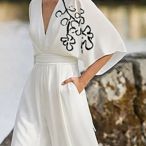 Load image into Gallery viewer, Summer White Pant Jumpsuits for Women Flower Print Pleated Pockets Half Sleeves Deep V-Neck Jumpsuits for Ladies
