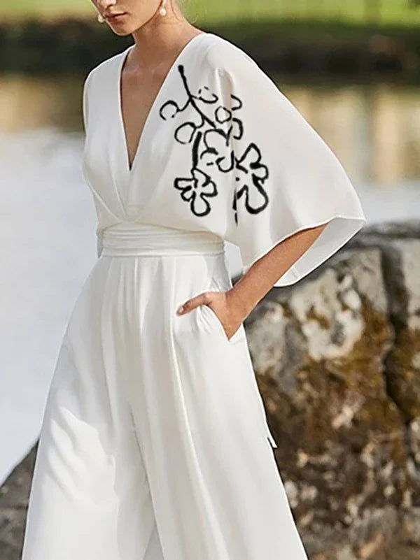 Summer White Pant Jumpsuits for Women Flower Print Pleated Pockets Half Sleeves Deep V-Neck Jumpsuits for Ladies