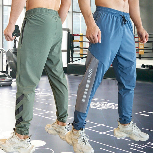 Load image into Gallery viewer, Gym Fitness Workout Sweatpants Running Athletic Apparel Outdoor Training Sports Trousers Elastic Waist Zipper Pockets Long Pants
