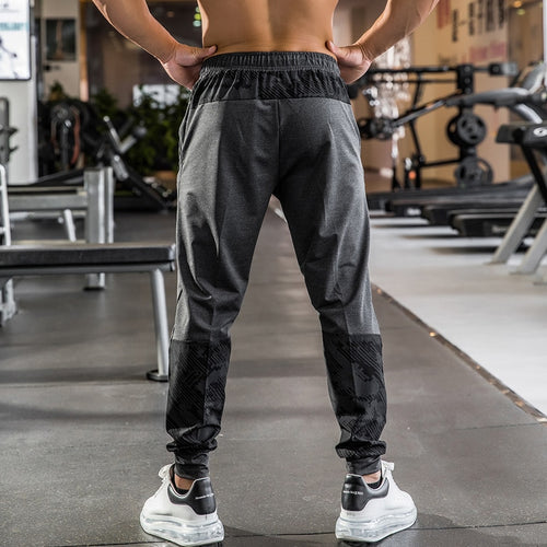 Load image into Gallery viewer, High Quality Camouflage Sweatpants Men Gym Fitness Sports Trousers Running Trackpants Elastic Dry Fit Zipper Pockets Long Pants
