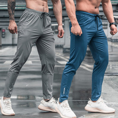 Load image into Gallery viewer, Men Sport Trousers with Pockets Running Workout Pants Quick Dry Training Jogger Sweatpants High Quality Fitness Bottoms
