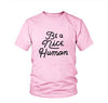 pink tee black text