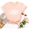 peach tee white text