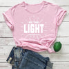 pink tee white text