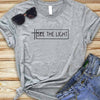 gray tee black text
